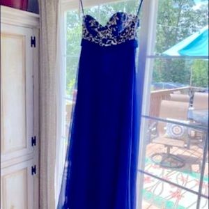 Beautiful boutique prom dress worn once.